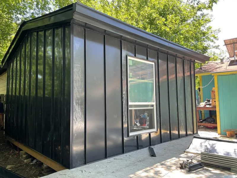 Black standing seam metal wall panels for Metal Roof Installation in Marlin