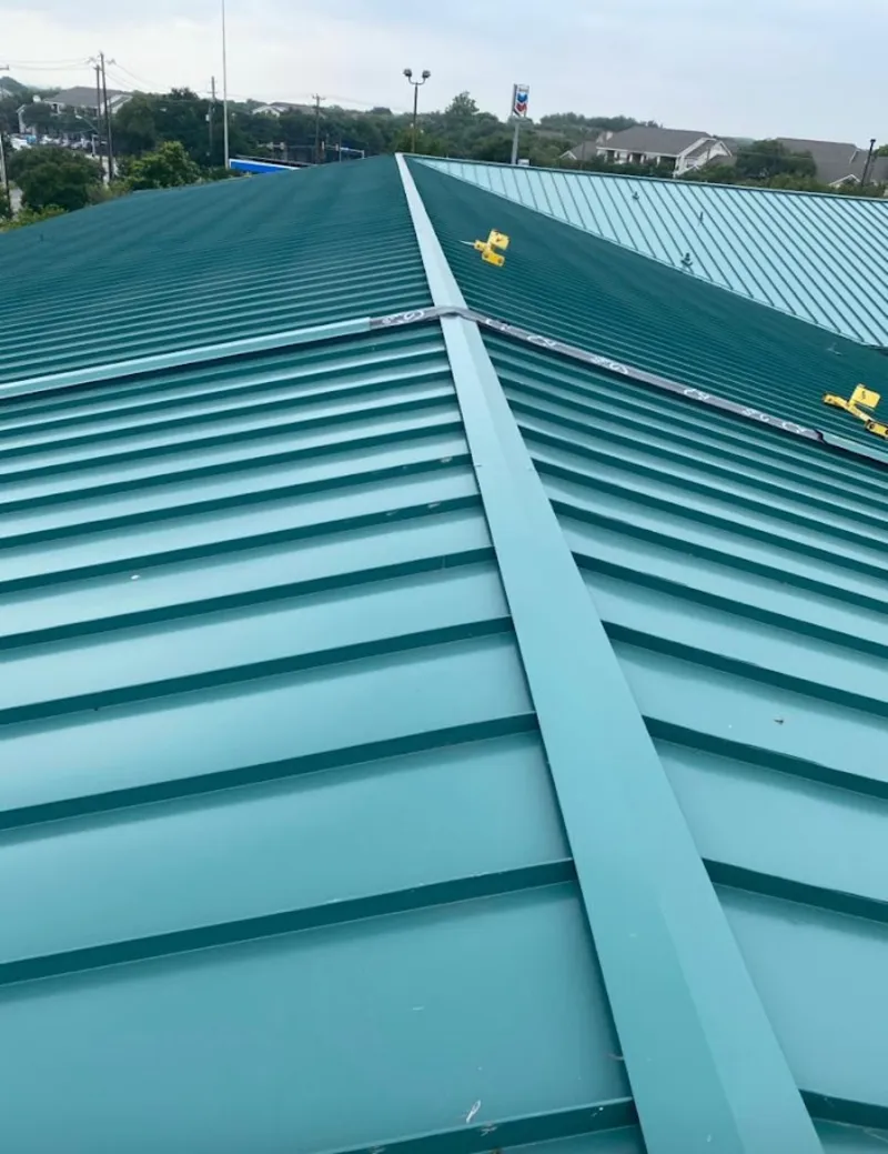 Green commercial metal roof ridge and valley for Metal Roof Repair in Marlin